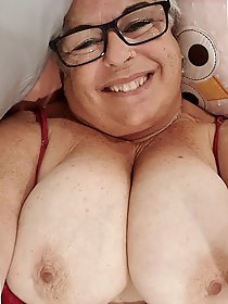 Slim older businesswomen are posing naked for money