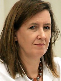 Elegant older granny is getting naked