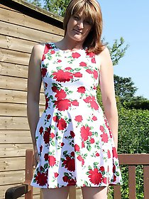 Naughty british housewife playing in her garden