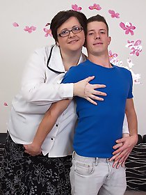 Big breasted mature lady fooling around with her younger lover