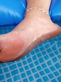 Relaxed feet in the water