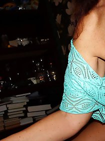 A woman in her prime enjoys posing for the camera.